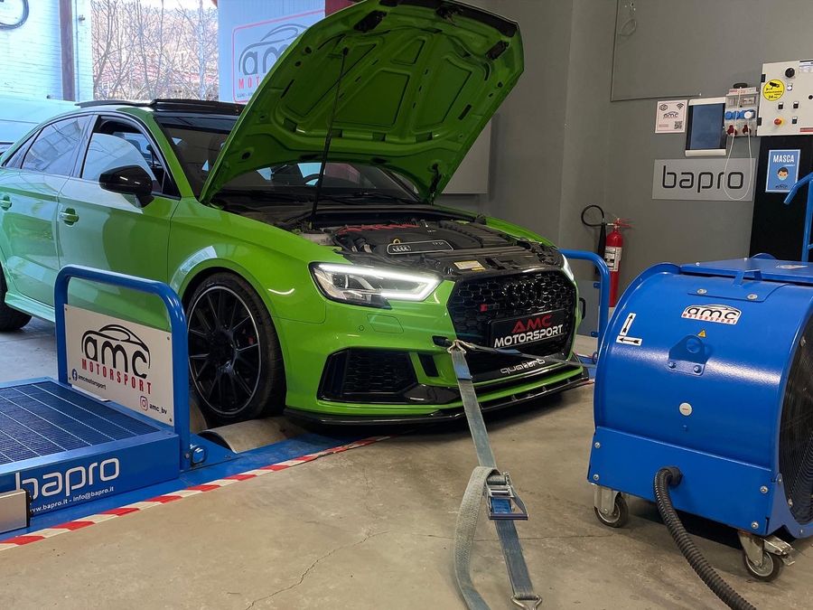 Green Audi RS3 on the dyno, with the cooling fans