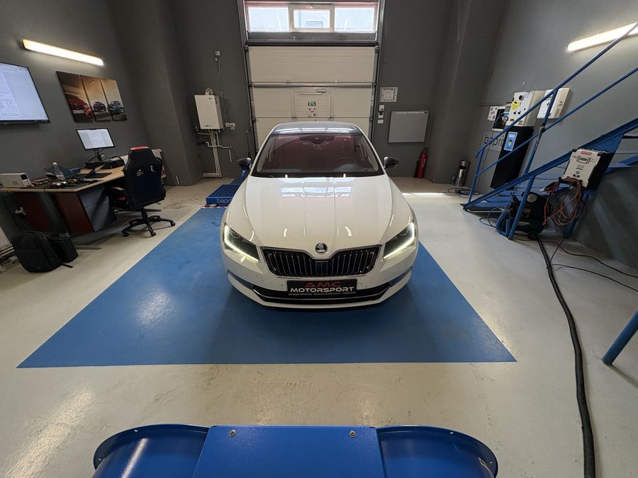 White Skoda on the dyno, front view