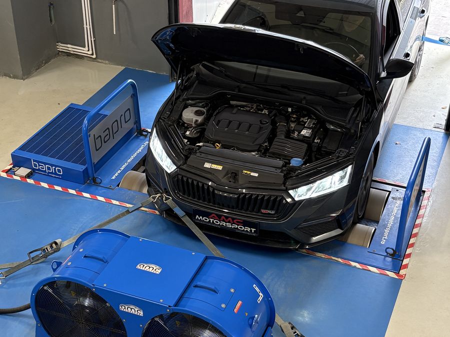 Black Skoda on the dyno, with the cooling fans